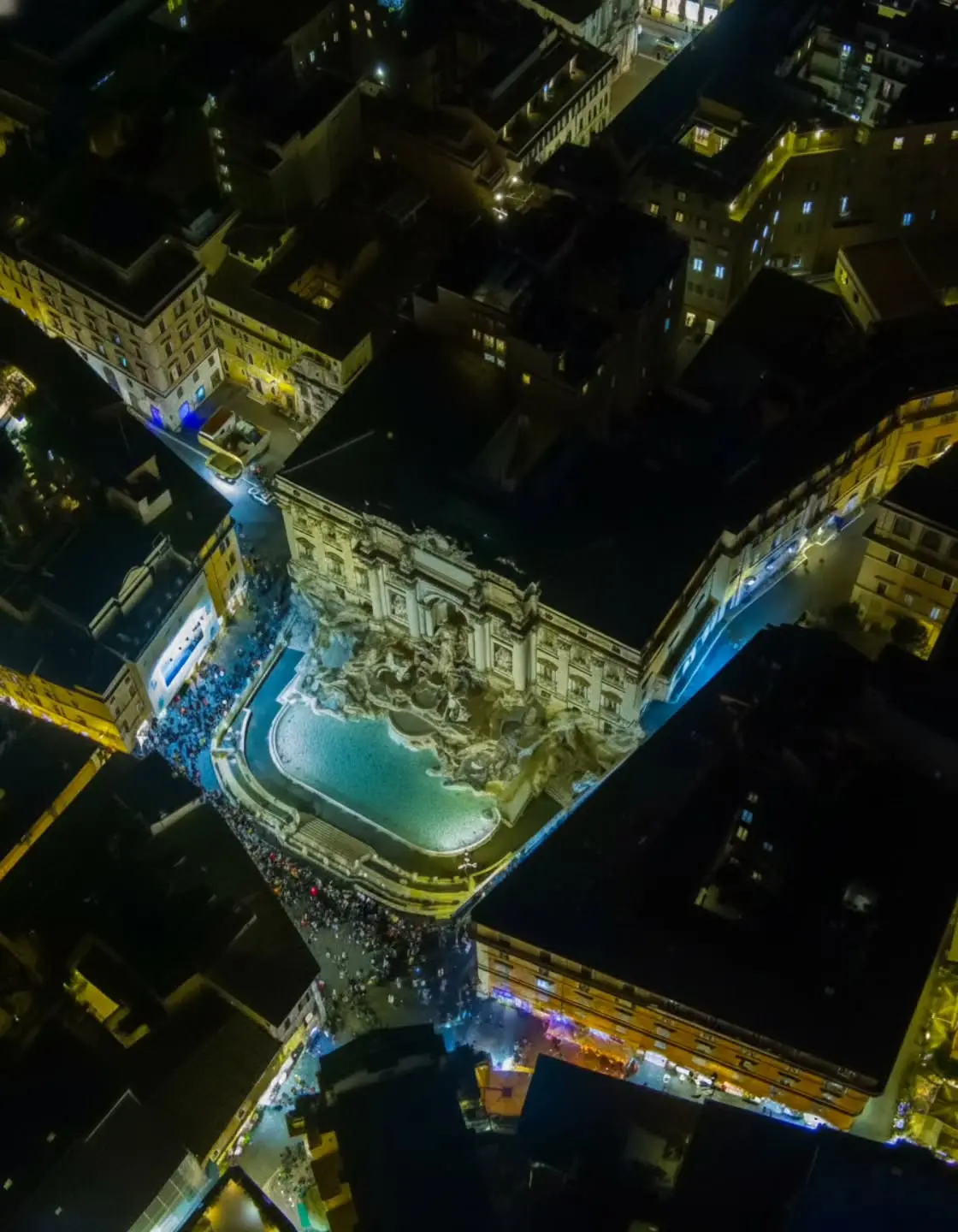 Night aerial photograph of the Trevi Fountain and central Rome by Dimitris Kyriakoulis