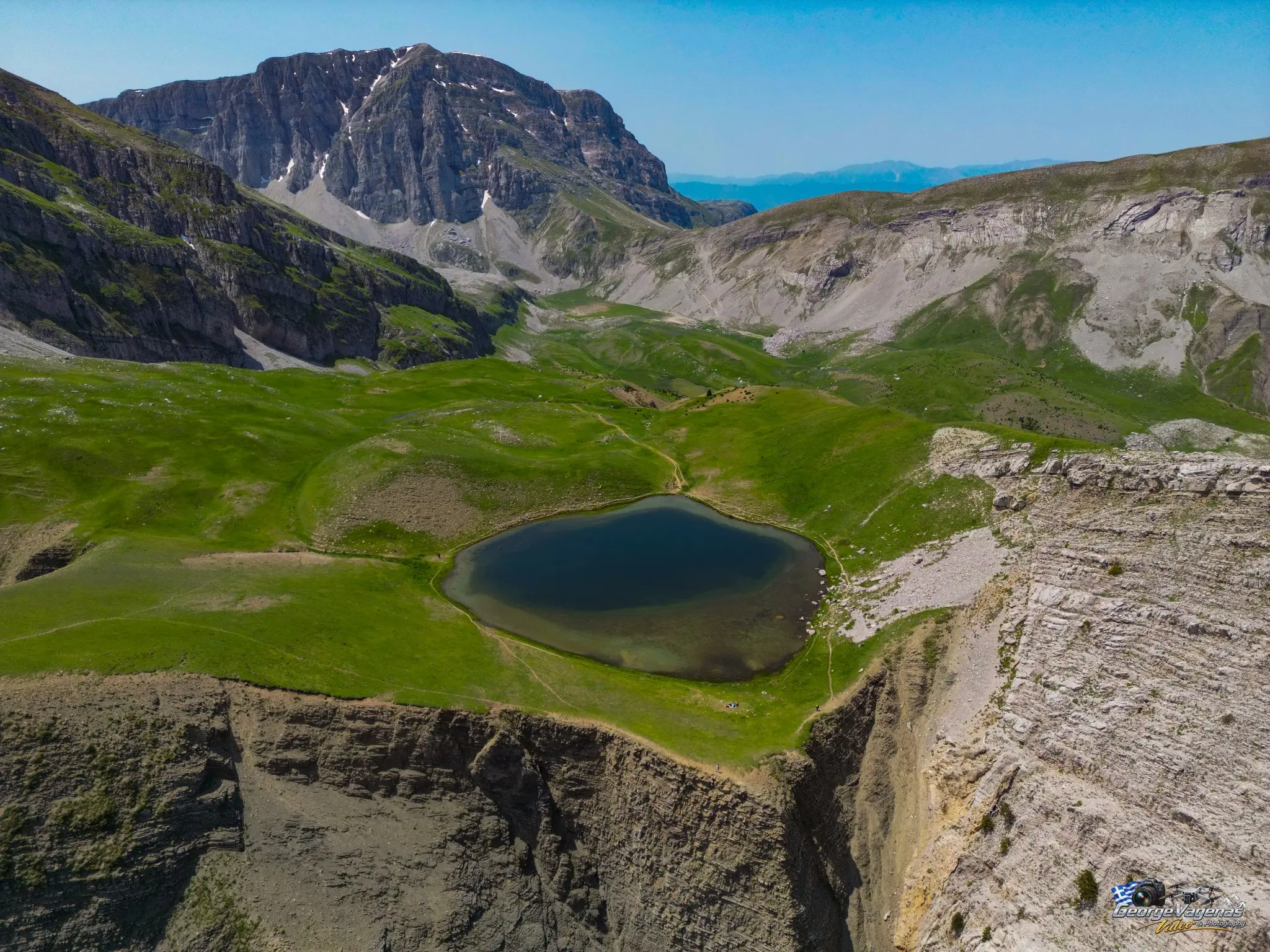 Aerial landscape of the Dragon Lake of Tymfi by George Vagenas
