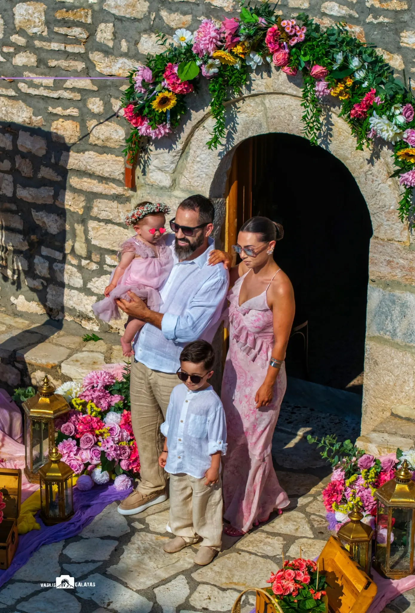 Aerial baptism family photograph by Basilis Galatas